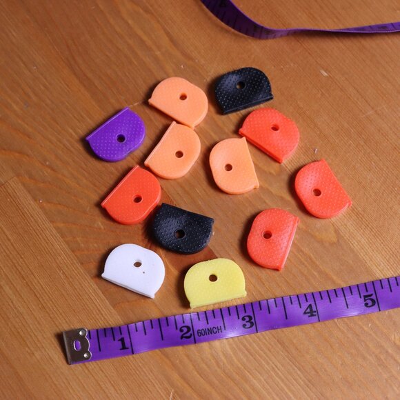 12 plastic key covers, flexible plastic, approx 1" wide - Picture 2 of 4